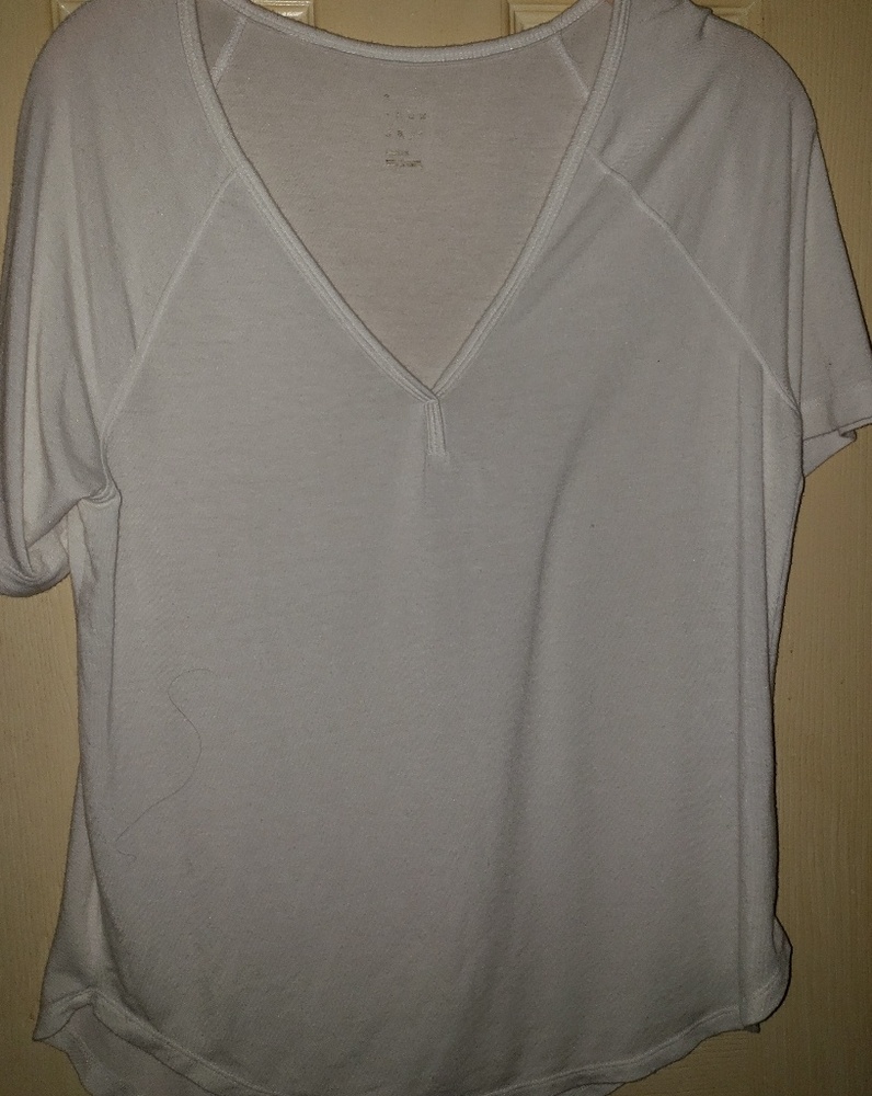 White extremely soft top nwot flounce shirt